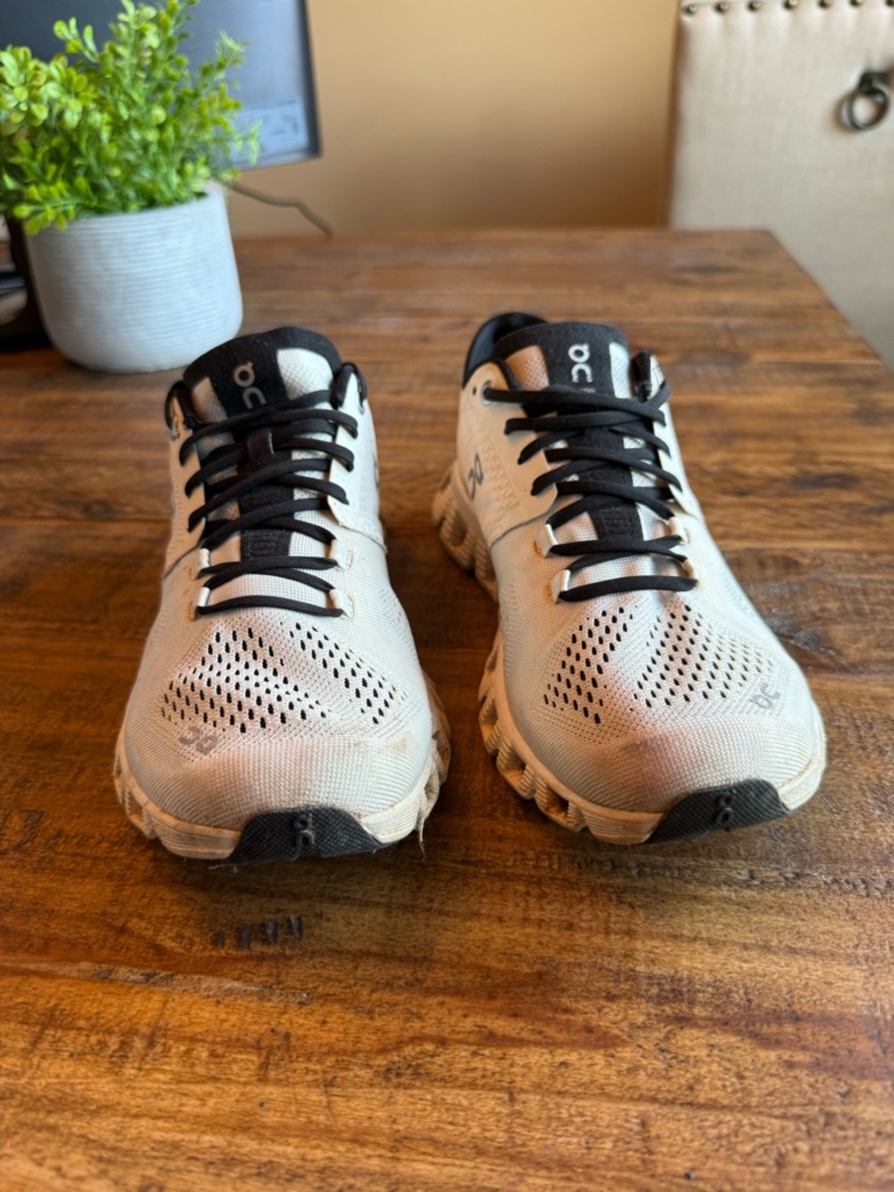 On Running Women's Sneakers in Off-White with Black Accents